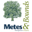 A logo with a tree and the words Metes and Bounds.